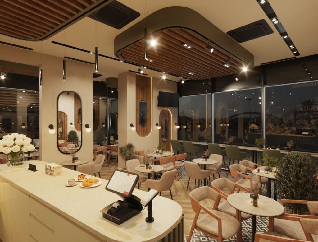 Café interior at night with central counter, wooden ceiling details, and modern dining tables