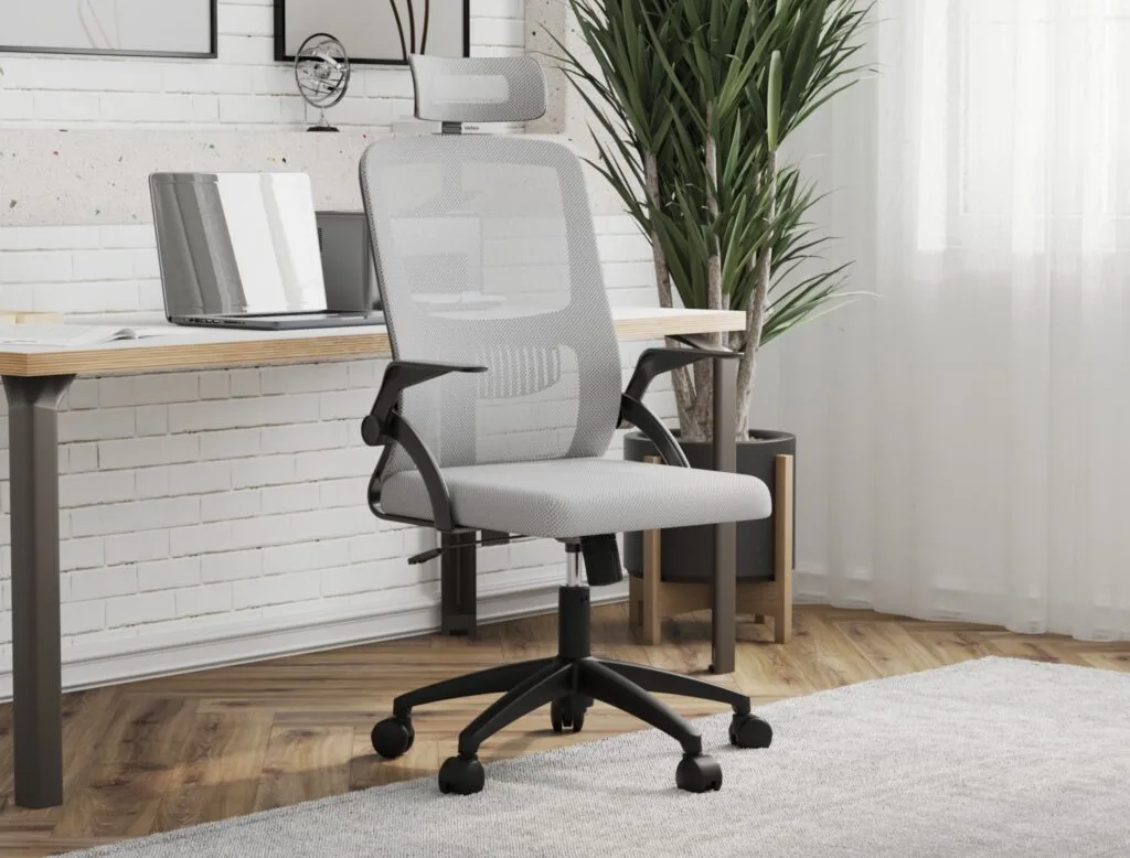 Grey mesh ergonomic computer chair in modern office interior – Intervibe Studio render