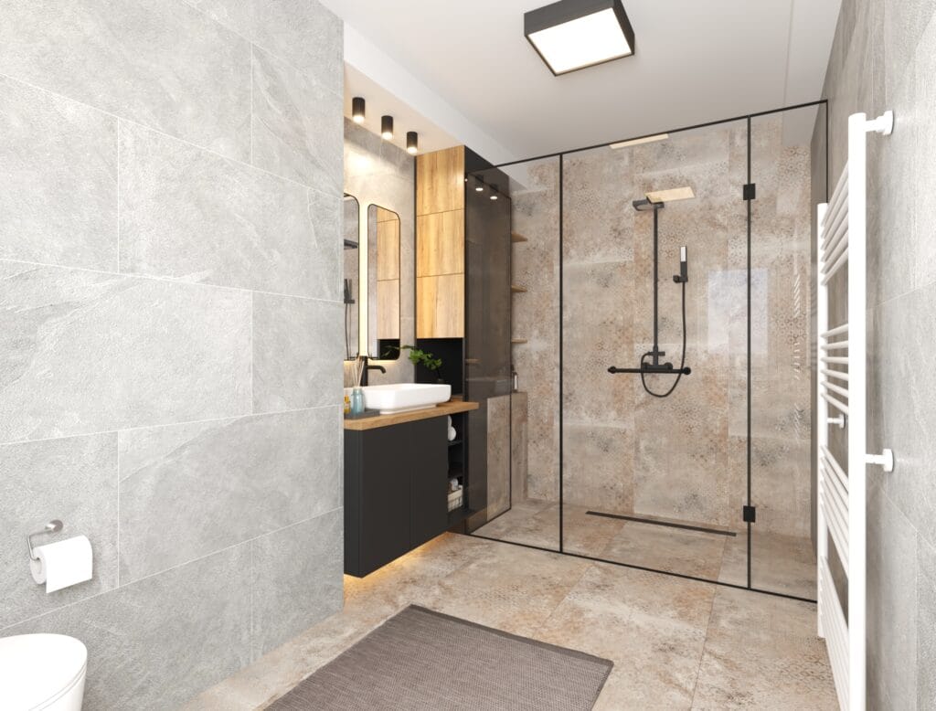 Modern bathroom with glass shower and gray wall tiles – Intervibe Studio