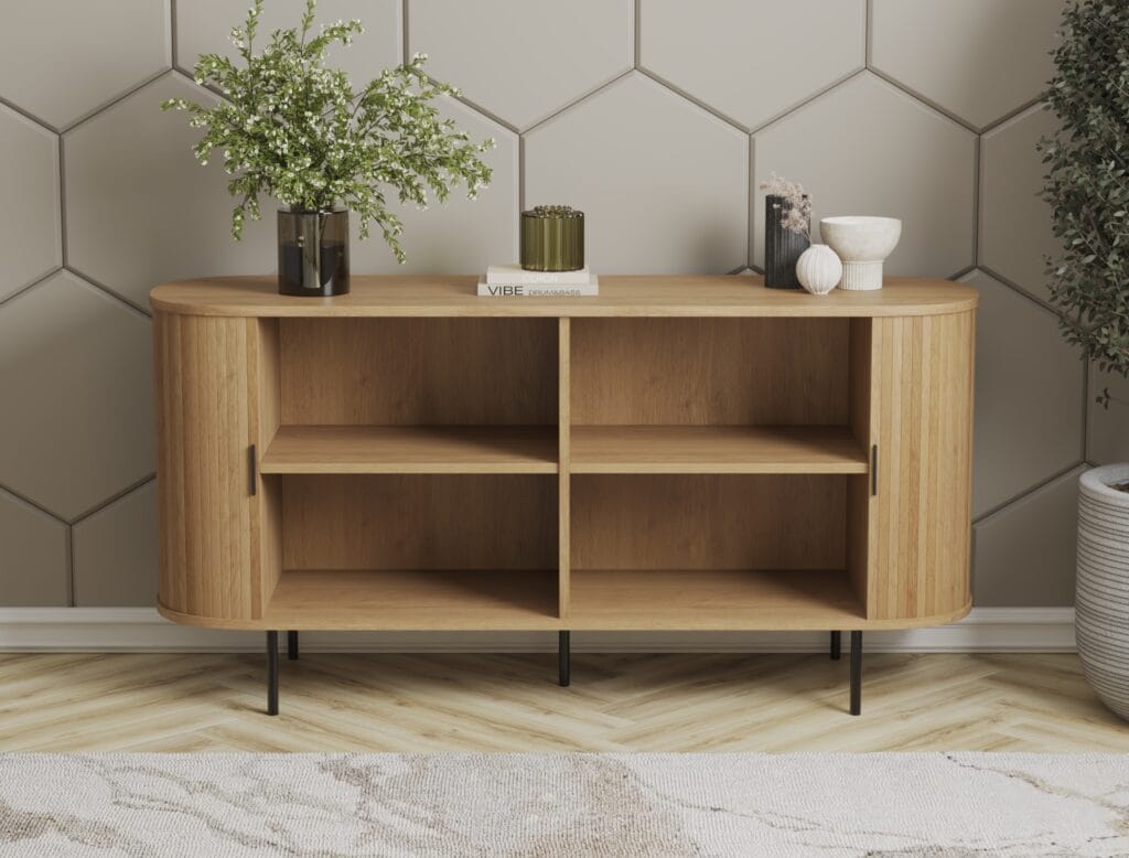 Oval wooden TV stand with rounded edges and black legs.