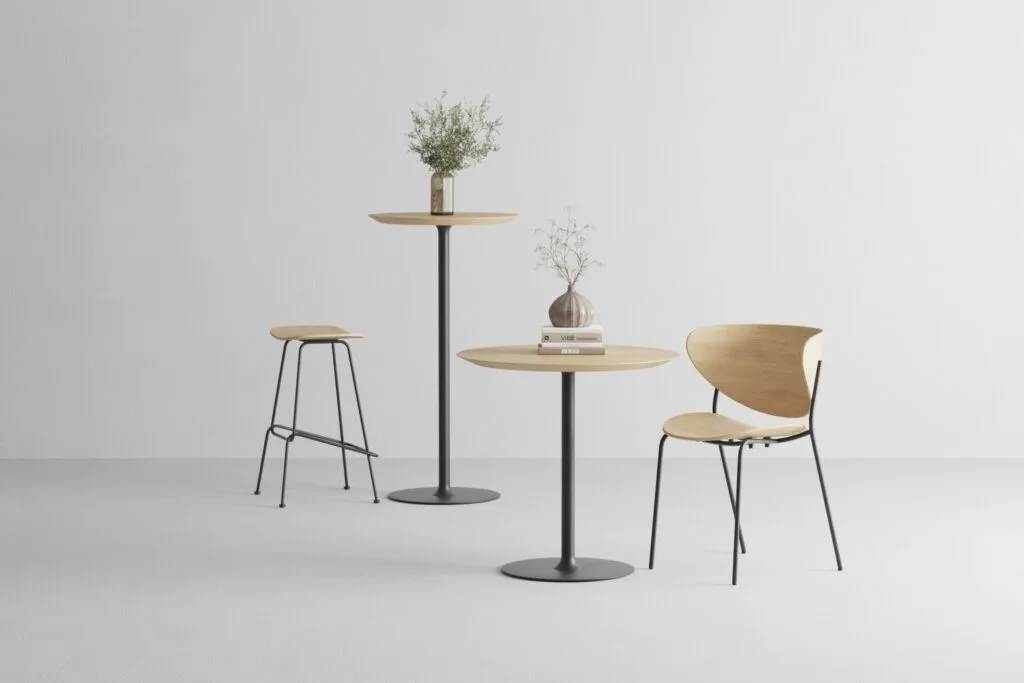 Set of round bistro tables with wooden tops and black metal bases styled with chairs – 3D render
