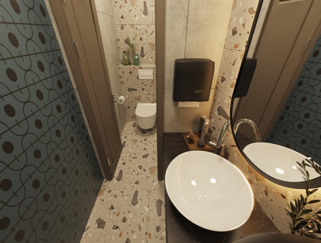 Top view of men’s restroom with terrazzo walls, sink basin, and toilet