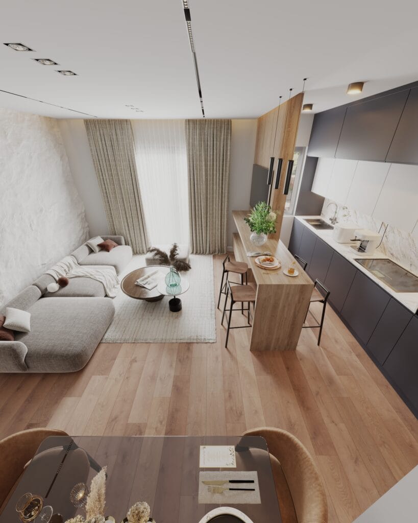 Elevated view of an open-plan living room, dining area and compact modern kitchen