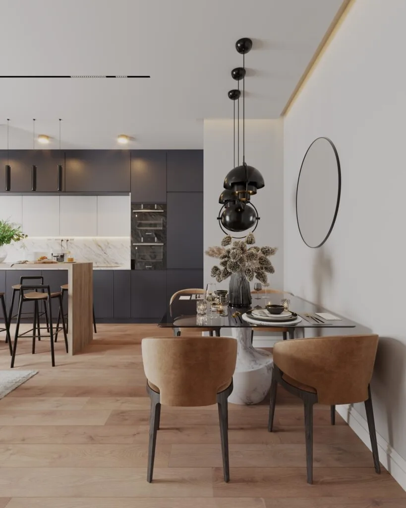 Modern dining area with black pendant lights and an open-plan kitchen interior