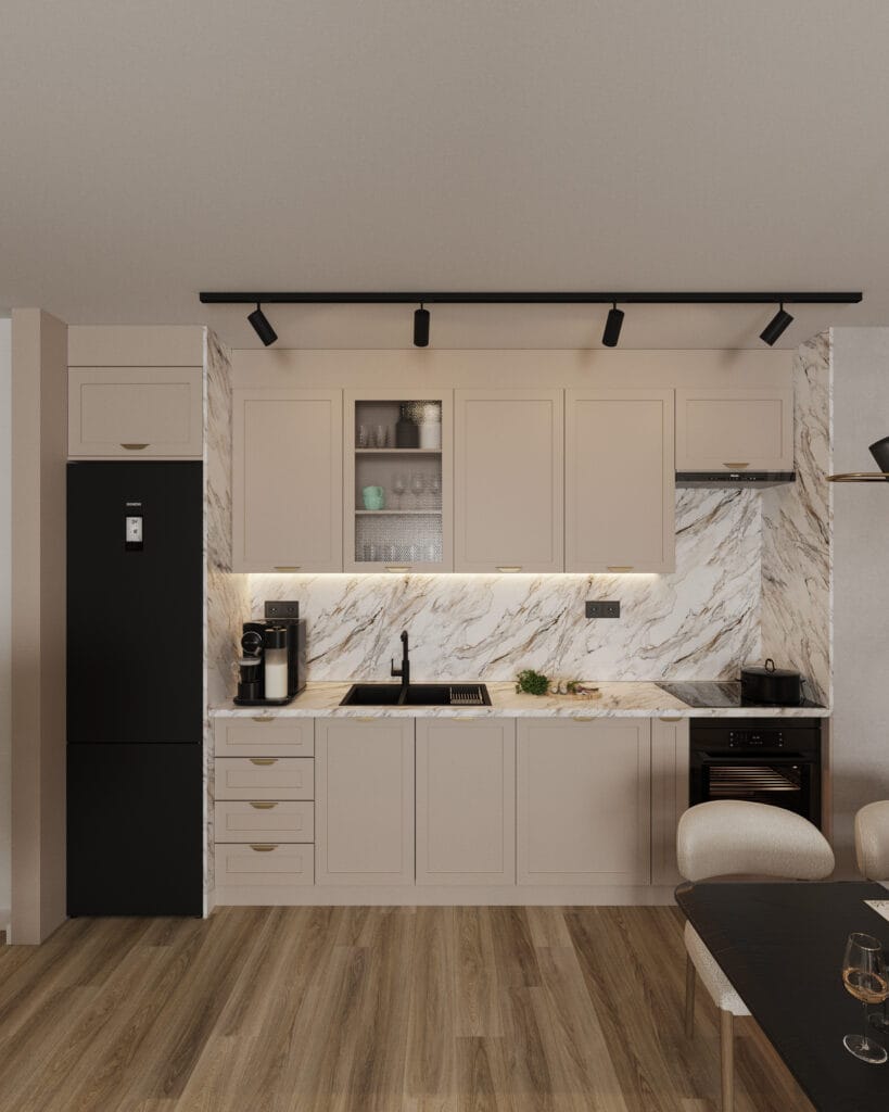 Modern beige kitchen with marble backsplash, integrated appliances and black track lighting