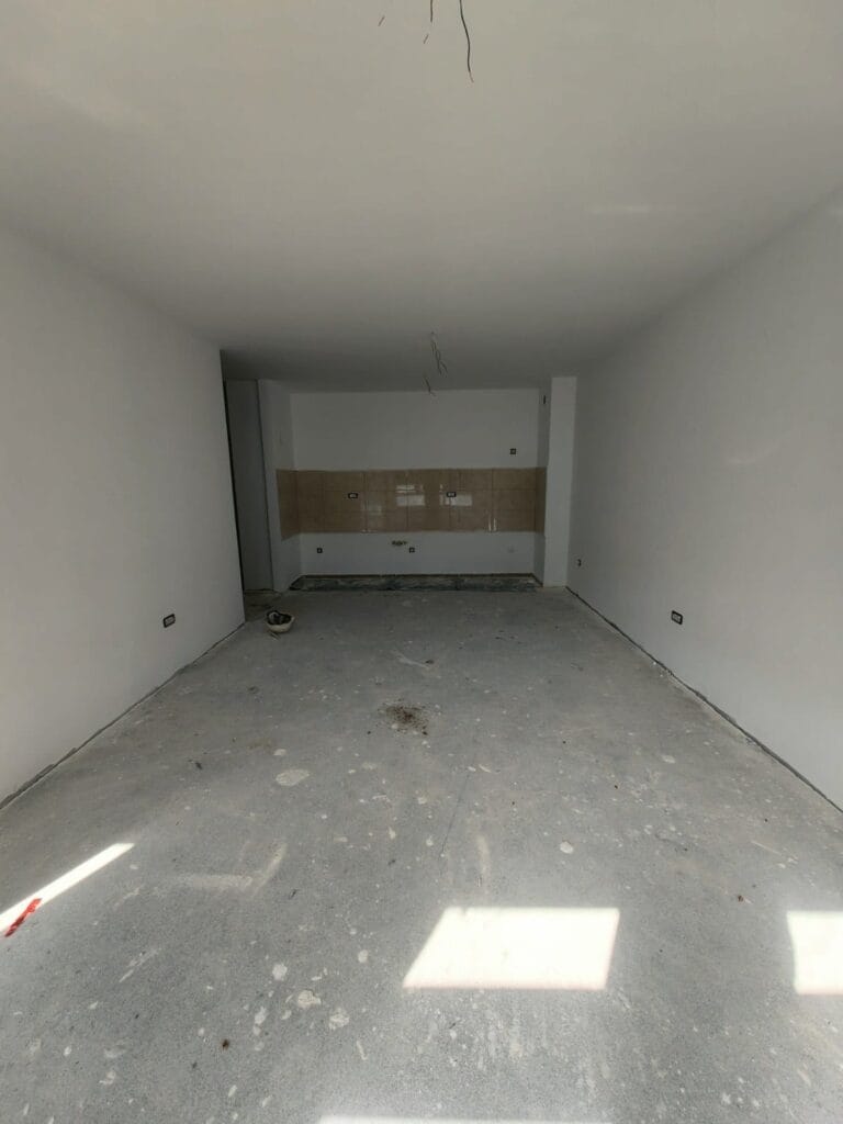 Unfinished open-plan apartment before interior design and renovation