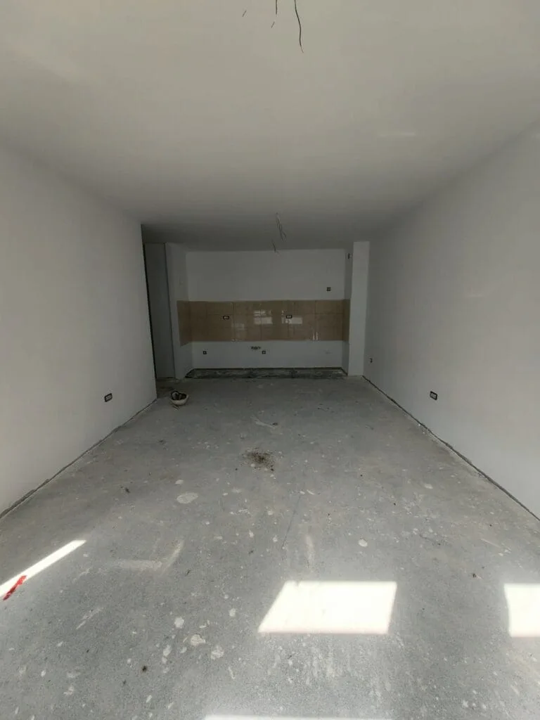 Unfinished open-plan apartment before interior design and renovation