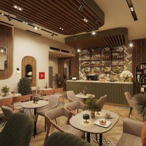Café interior at night with cozy seating, decorative wall shelving, and wooden finishes