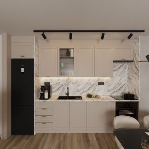 Modern beige kitchen with marble backsplash, integrated appliances and black track lighting