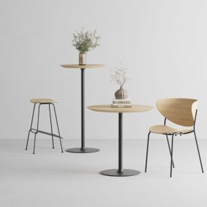 Set of round bistro tables with wooden tops and black metal bases styled with chairs – 3D render